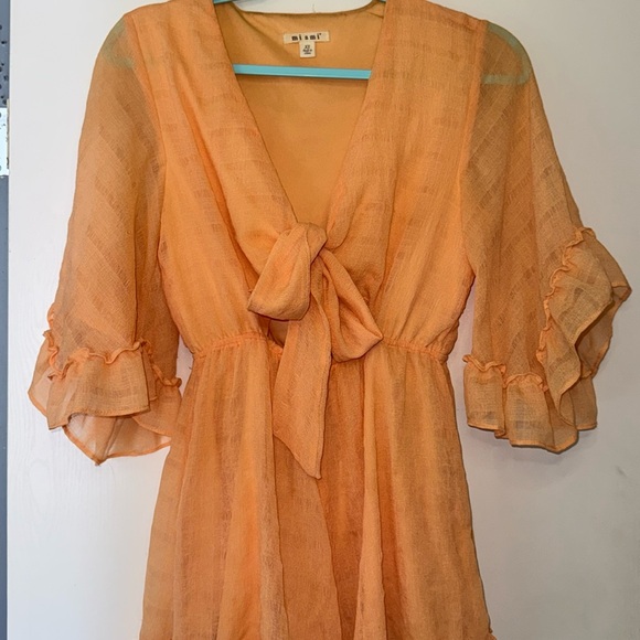 Light orange flowy romper - Picture 1 of 4